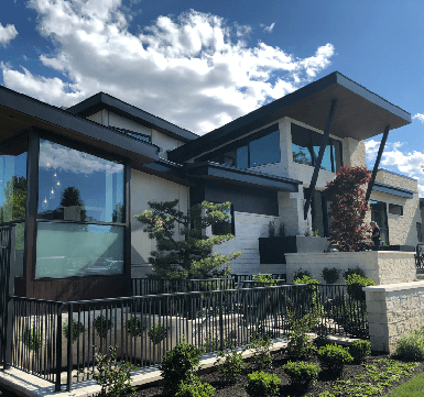 View of an elegant house in Vancouver with a stylish gutter installed by ORMA Gutter Solutions.